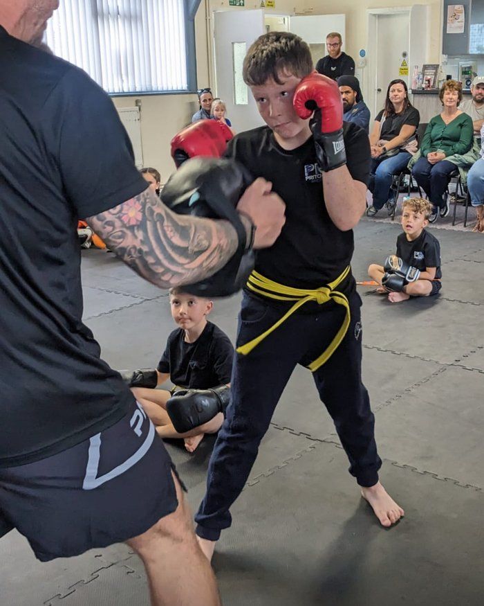 <center>POSITIVE KICKBOXING TRAINING FOR KIDS AGES 7–11 IN HOLYHEAD<center>